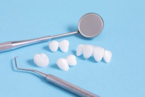 Zircon dentures samples with dental tools stock photo