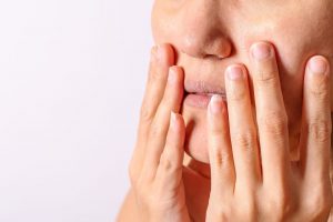 Allergic women have eczema dry nose and lips on winter season closeup stock photo