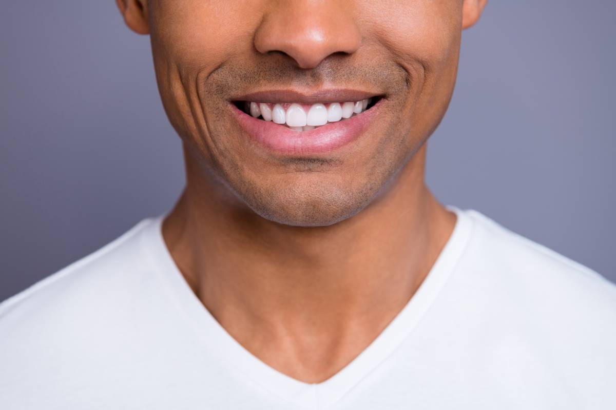 African American man with healthy straight clean teeth stock photo